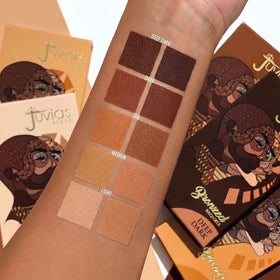Juvia's Place close-up of pressed powder texture showing smooth matte finish benefit even application