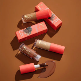 Juvia's Place concealer applied under eye illustrating brightening benefit and crease reduction