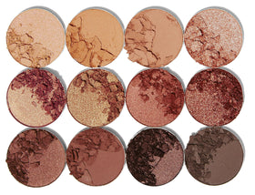 Juvia's Place brush applying shadow to lid showing application technique benefit: precise placement