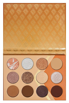 Juvia's Place pan close-up showing fine pressed pigment texture and high payoff