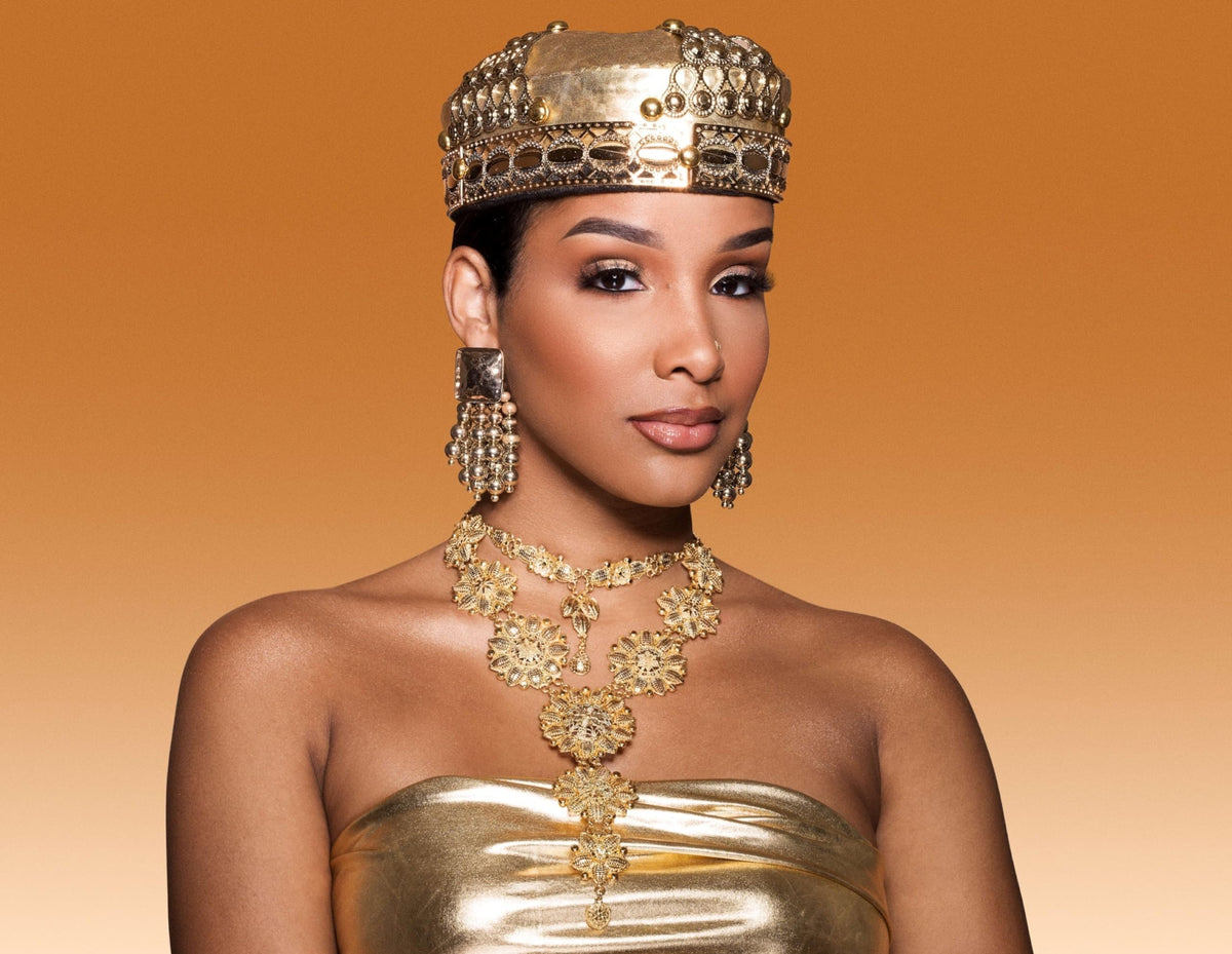 Juvia's Place lifestyle evening look featuring gold-copper eye makeup benefit: wearable glamour