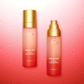 Juvia's Place spray used on a made-up model demonstrating setting and hydrating benefit