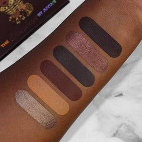 Juvia's Place palette held in hand to show compact size and travel convenience
