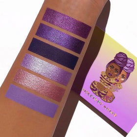 Juvia's Place palette held in hand for scale and travel-friendly convenience benefit