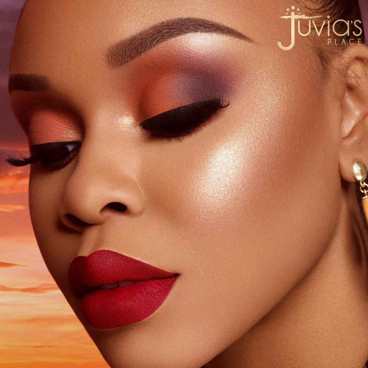 Juvia's Place palette in hand showing compact size and portability