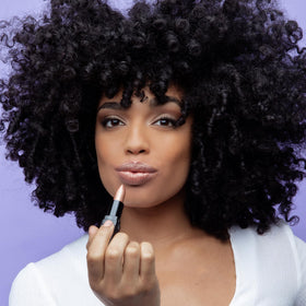 Juwel Cosmetics applied on lips in lifestyle scene for polished finish