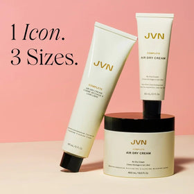 JVN applying product to damp hair to enhance natural waves