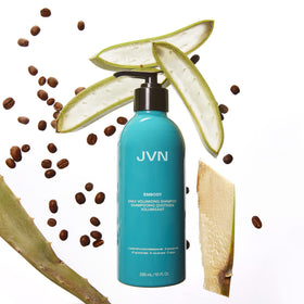 JVN Embody bottle held in hand for scale and travel-friendly size