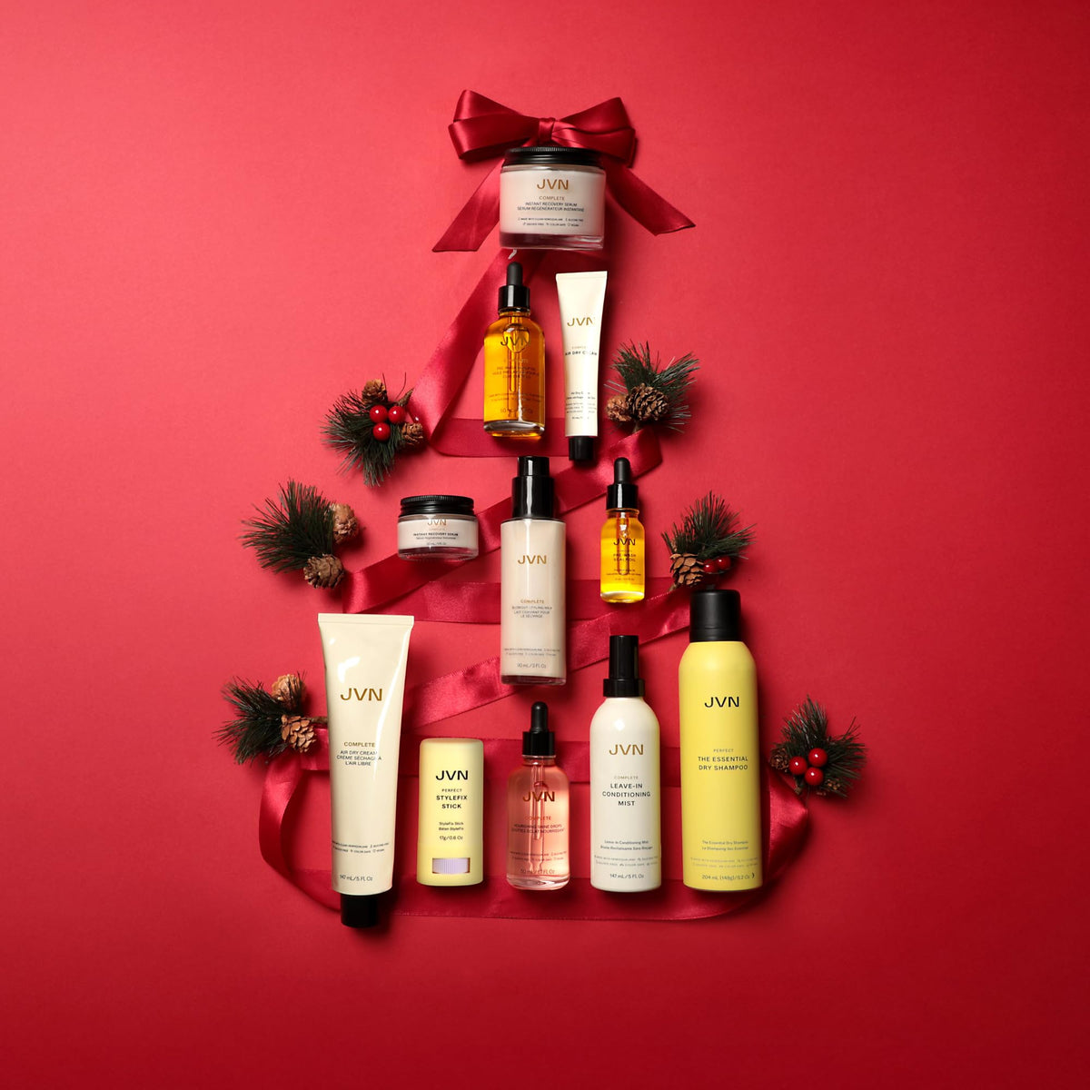 JVN products applied to damp hair demonstrating manageability
