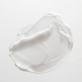 JVN conditioner on bathroom shelf styled for everyday hair care