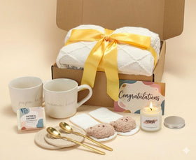 JW Passion congratulatory card with all contents flatlay, complete gift set view