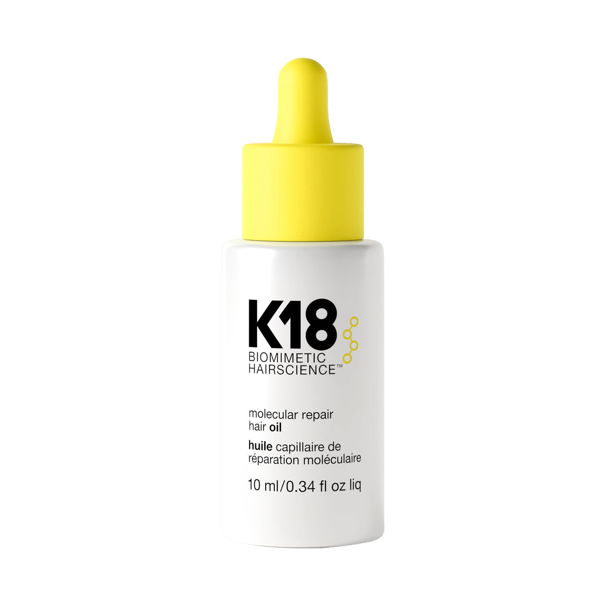 K18 front bottle showing product branding and compact design for travel