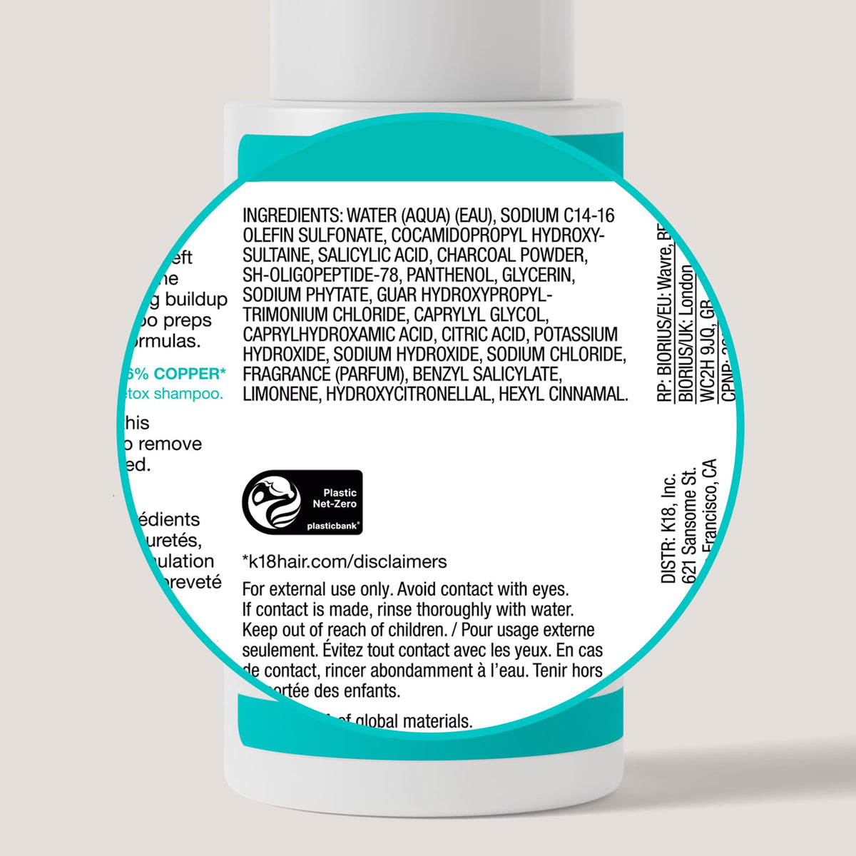 K18 shampoo in shower being massaged into hair showing effective buildup removal benefit