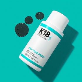 K18 charcoal shampoo lather close-up showing texture and clarifying action benefit