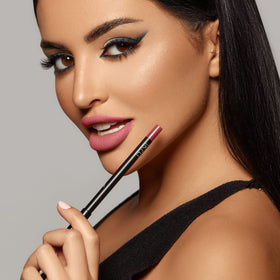 K7L dark pink lipliner applied on lips in lifestyle photo showing longwear benefit