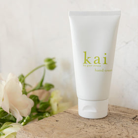 kai hand cream texture closeup highlighting creamy shea blend that nourishes skin