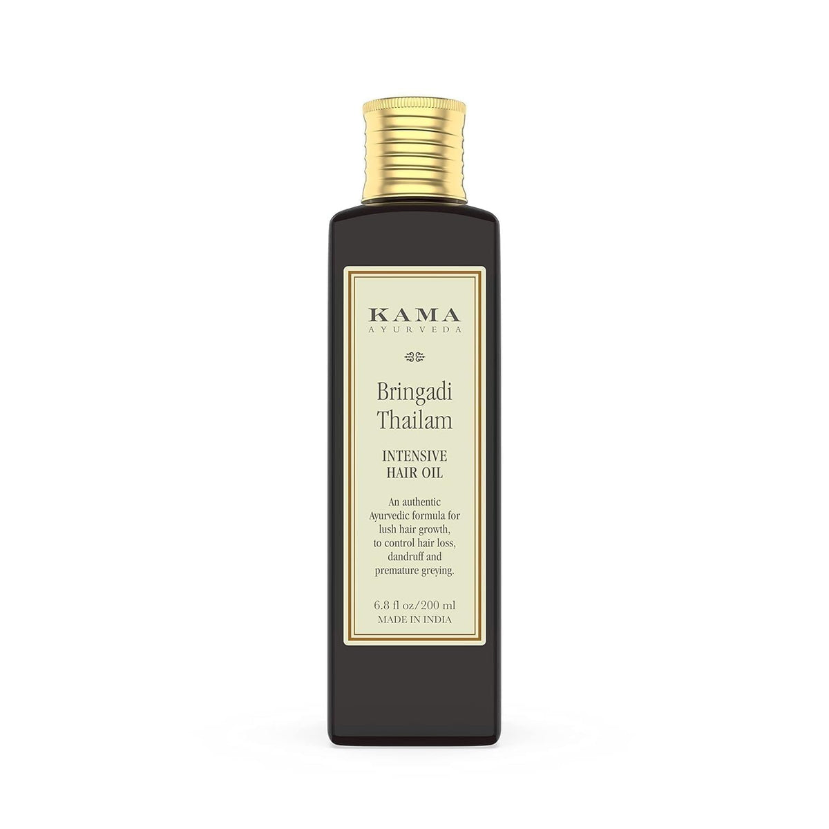 Kama Ayurveda oil drops on hands illustrating lightweight texture and nourishment