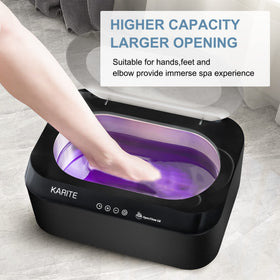 Karite hands soaking in melted wax illustrating soothing home spa comfort