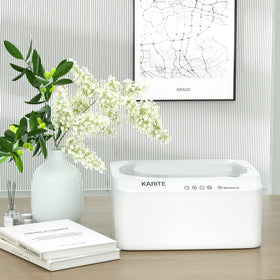Karite wax refills arranged beside warmer for convenient replenishment