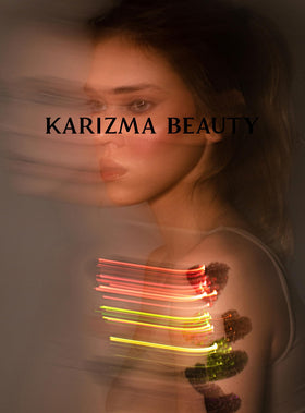 KARIZMA model applying glitter on cheekbone demonstrating high-impact festival glow