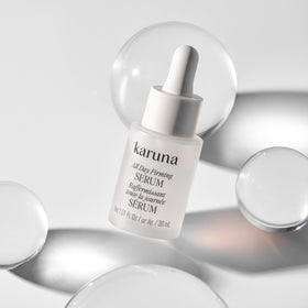 Karuna bottle on bathroom shelf demonstrating daily routine readiness