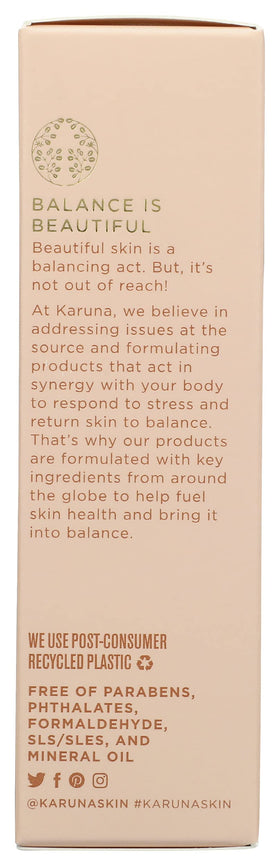 Karuna cream jar beside a coin to show 50ml size and travel-friendly convenience