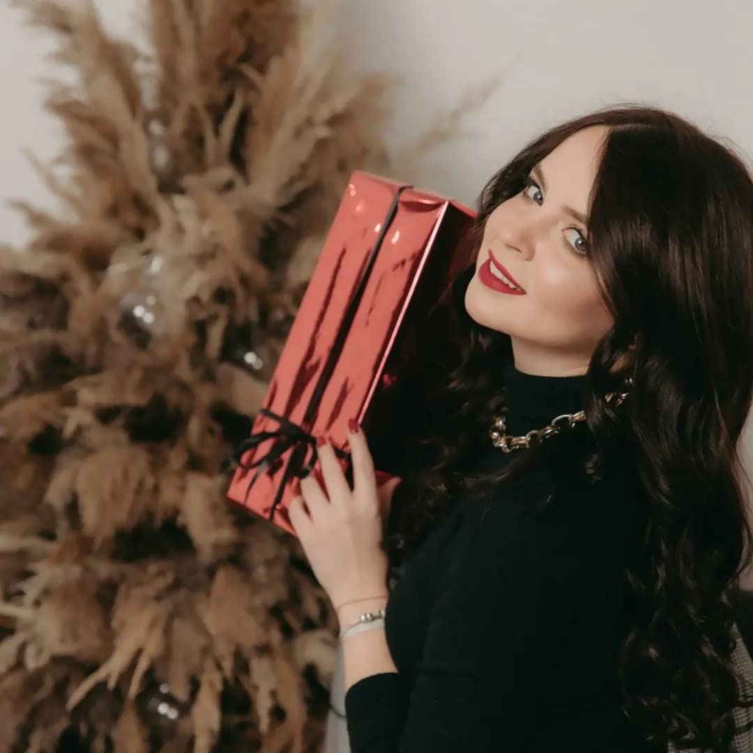 Kat Von D mini in hand for size comparison and portable convenience