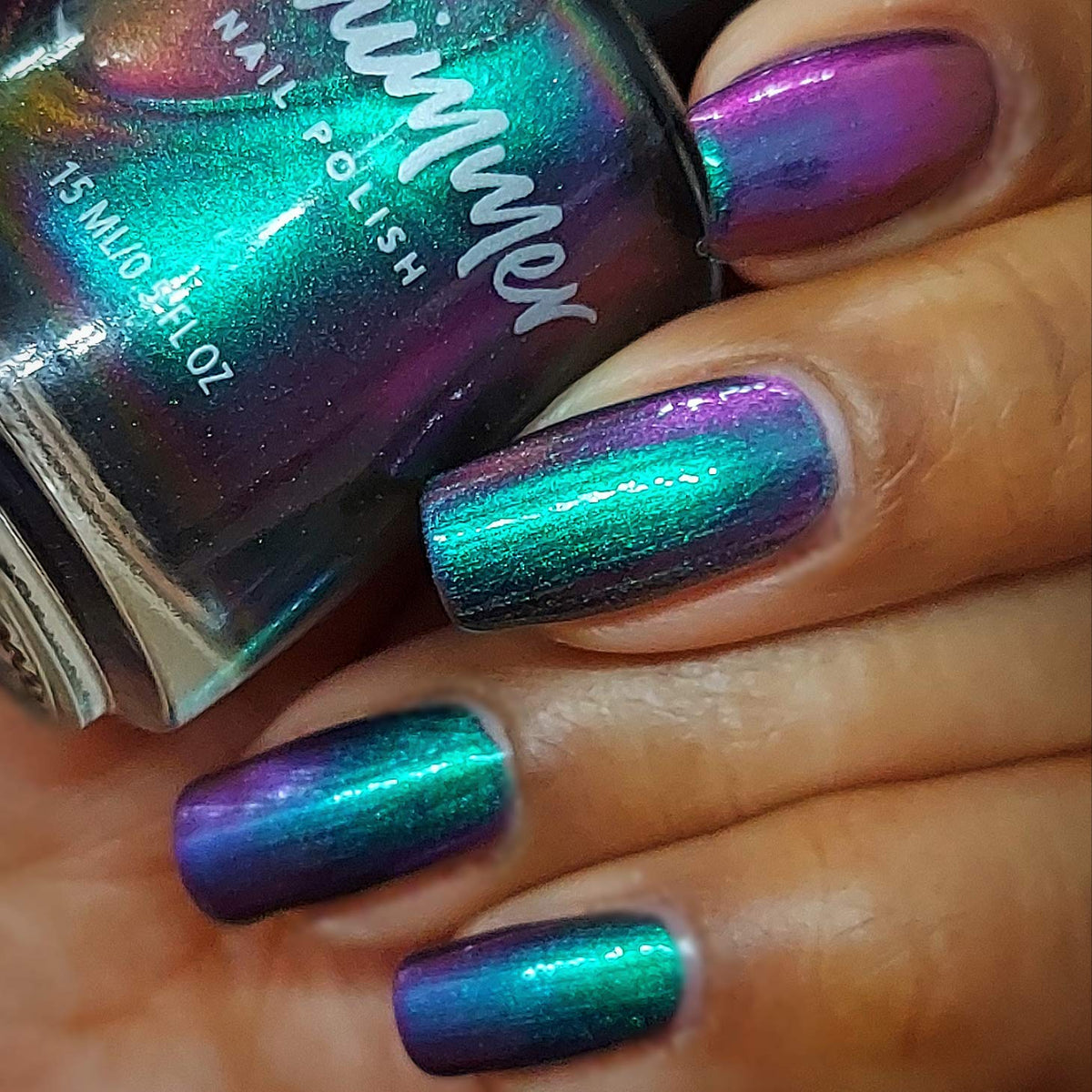 KBShimmer polish swatch stroke on nail tip showing true shade payoff