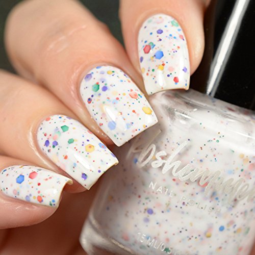 KBShimmer layered over black polish showing intense glitter pop benefit