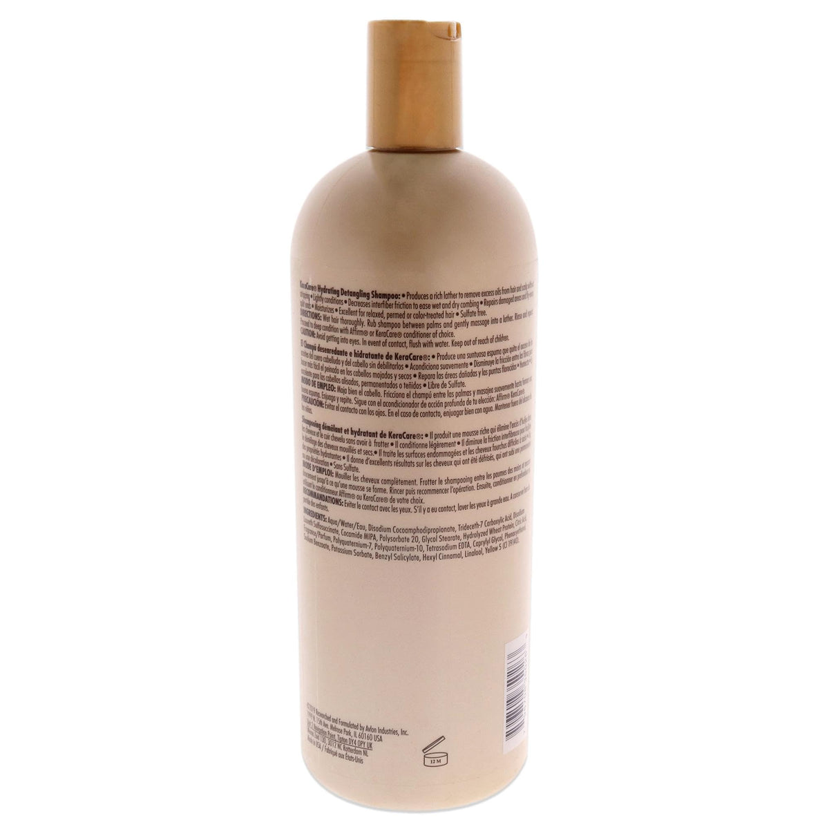 KeraCare shampoo poured into hand showing creamy texture and easy detangling