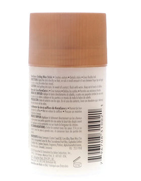 KeraCare wax stick held in hand displaying portable size advantage