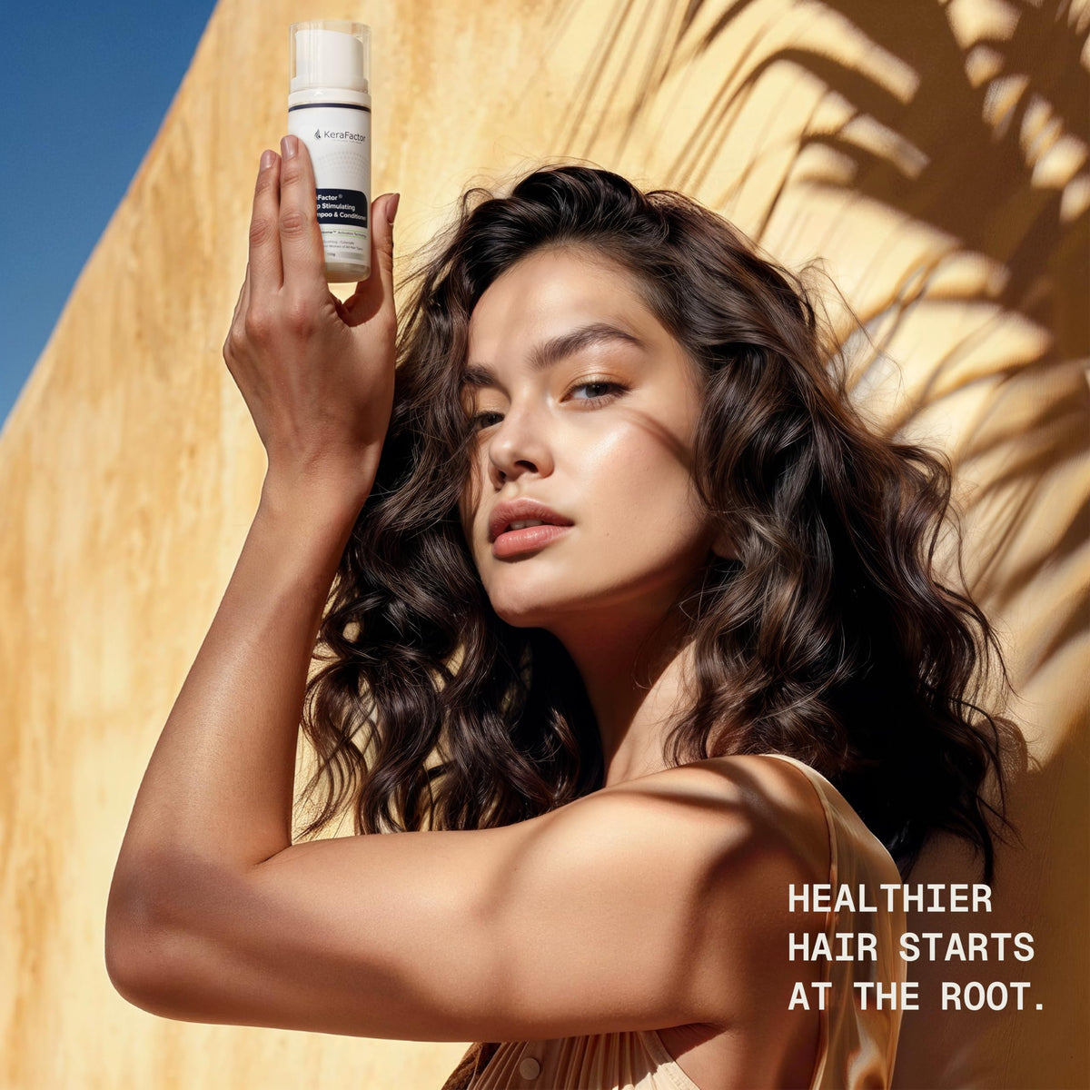 KeraFactor pump dispensing texture showing lightweight formula and easy dosing benefit