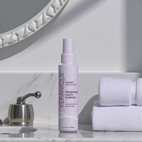 Keranique spray on bathroom shelf suggesting daily routine integration and convenience