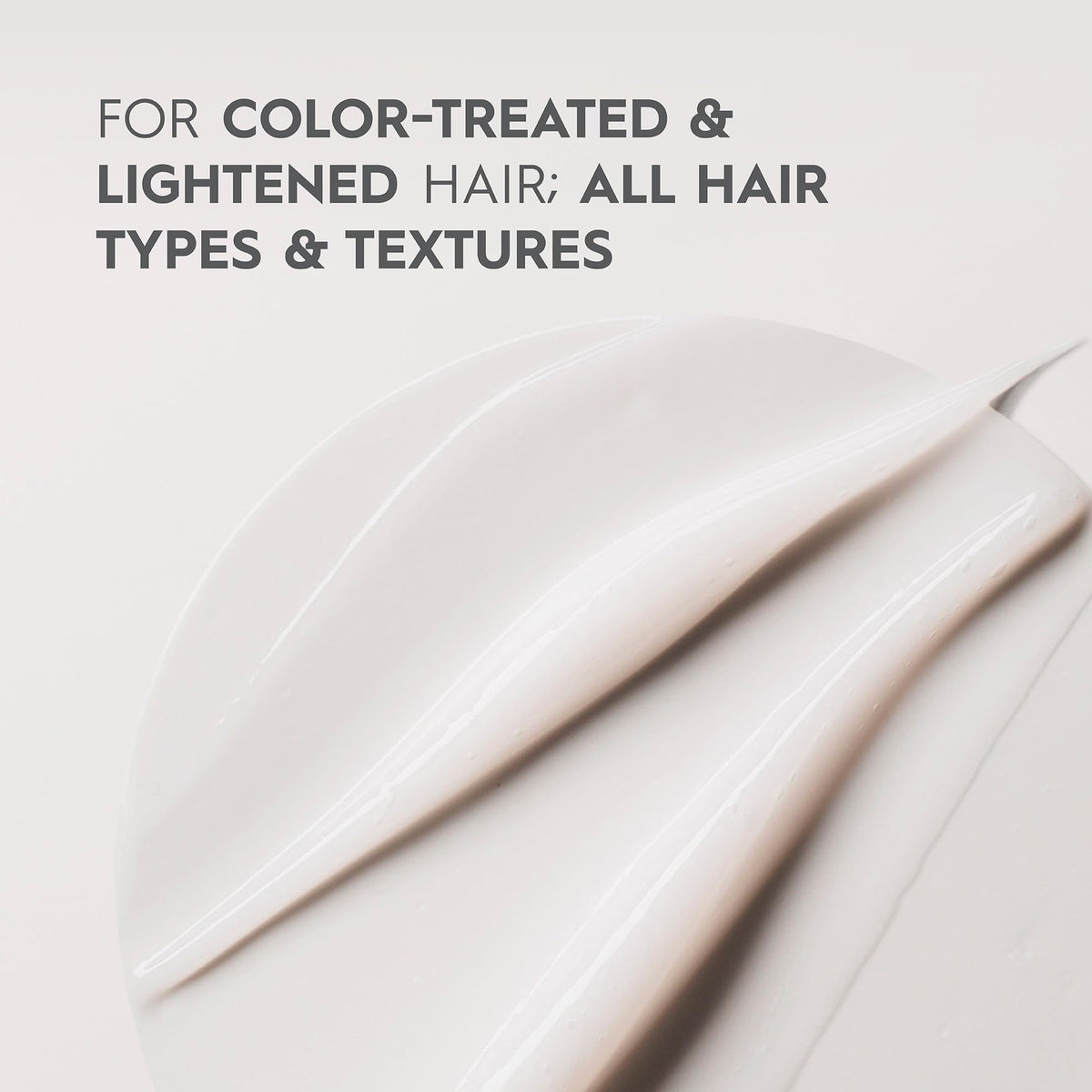 Kerasilk conditioner on bathroom shelf showcasing salon-care convenience