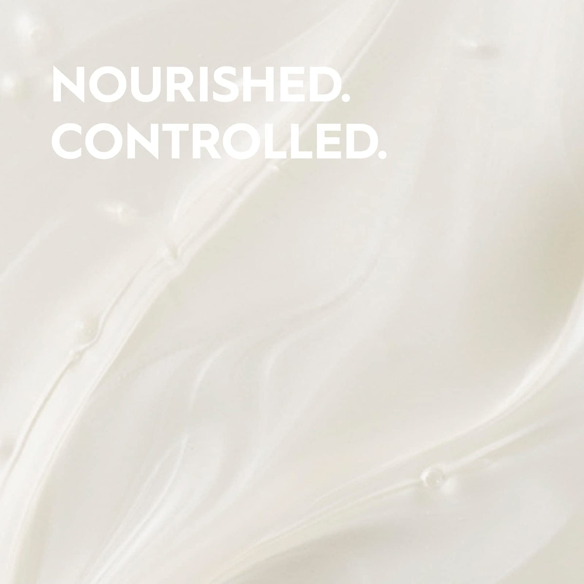 Kerasilk shampoo in hand showing 250ml scale and travel-friendly convenience