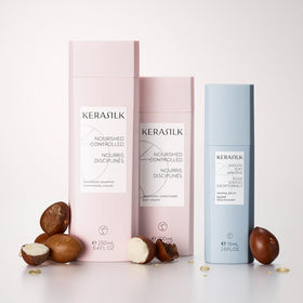 Kerasilk taming balm applied while blow-drying for heat protection