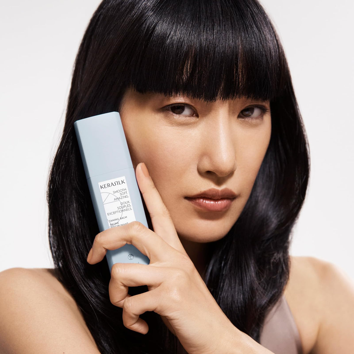 Kerasilk taming balm with shea oil droplet nourishing hair fiber