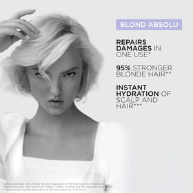 KÉRASTASE applying serum to towel-dried blonde hair for instant moisture
