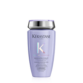 KÉRASTASE bottle front view showing tonal-correcting purple shampoo and branding