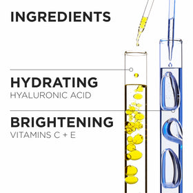 KÉRASTASE bottle held in hand for scale and convenient size
