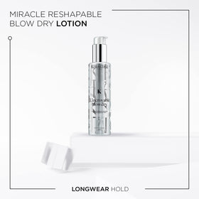 KÉRASTASE serum texture on hand, demonstrating lightweight spreadability and quick absorption benefit