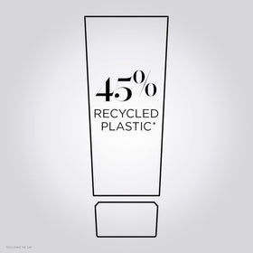KÉRASTASE bottle on shelf in bathroom suggesting daily restorative routine