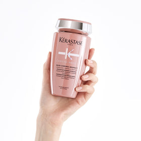 Before and after strand comparison demonstrating smoother KÉRASTASE-treated hair