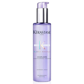 KÉRASTASE bottle front view showing branding and sleek packaging benefit: clear identification
