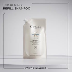 KÉRASTASE label detail with ingredients highlighting hyaluronic benefit