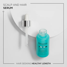 KÉRASTASE pipette dispensing serum illustrating precise application benefit