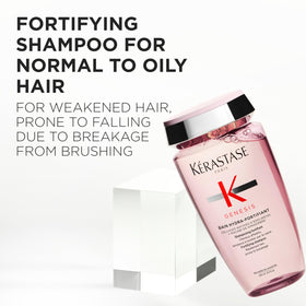 KÉRASTASE close-up of pump dispensing for precise shampoo control and ease
