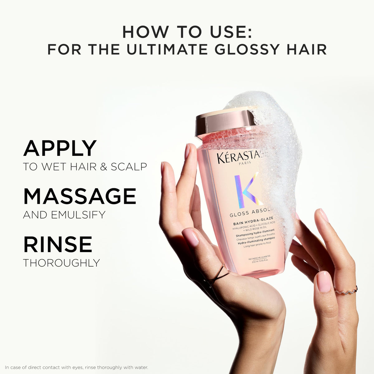KÉRASTASE in-shower use image demonstrating lathering for cleaner, glossier hair