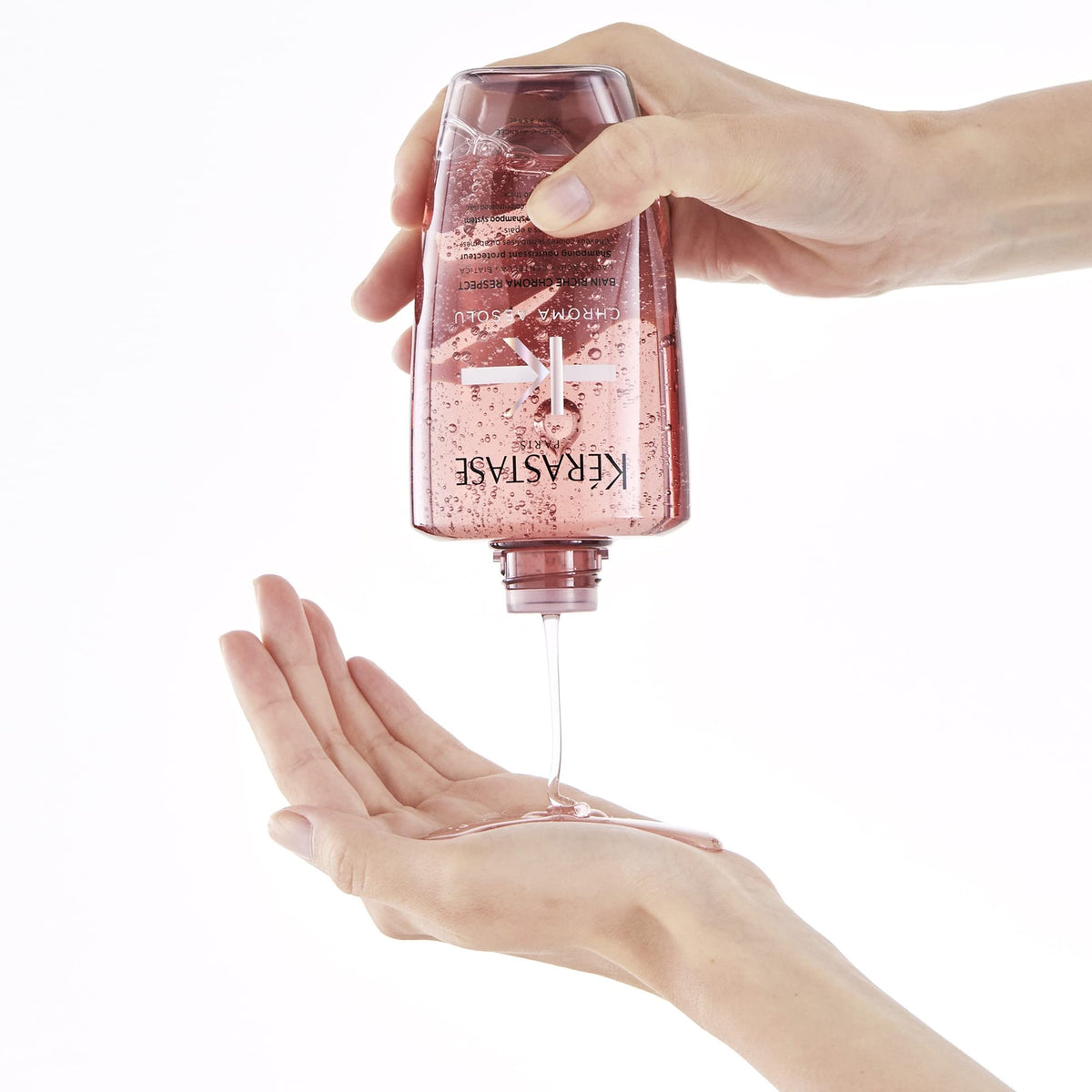 KÉRASTASE label closeup showing ingredients and salon-grade formulation