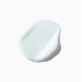 KÉRASTASE label highlighting Vita-Ciment technology and fiber-rebuilding benefit
